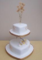 Gold Hearts and Lilies Wedding Cake  Ref IC029