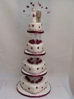 Four tiered heart cake with roses ref IC088